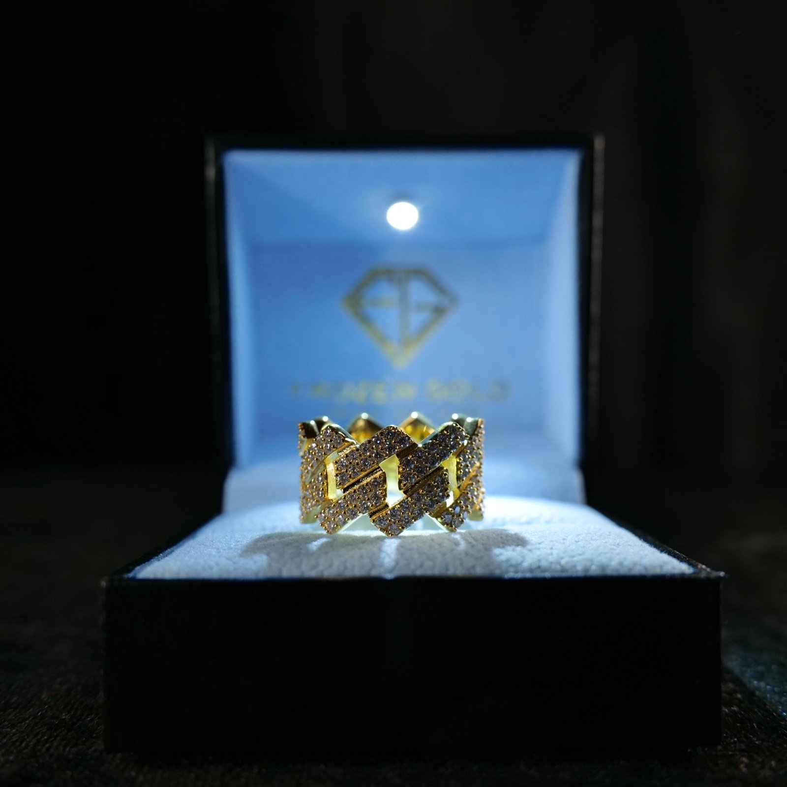 Yellow-gold Cuban ring in a Frozen Gold box